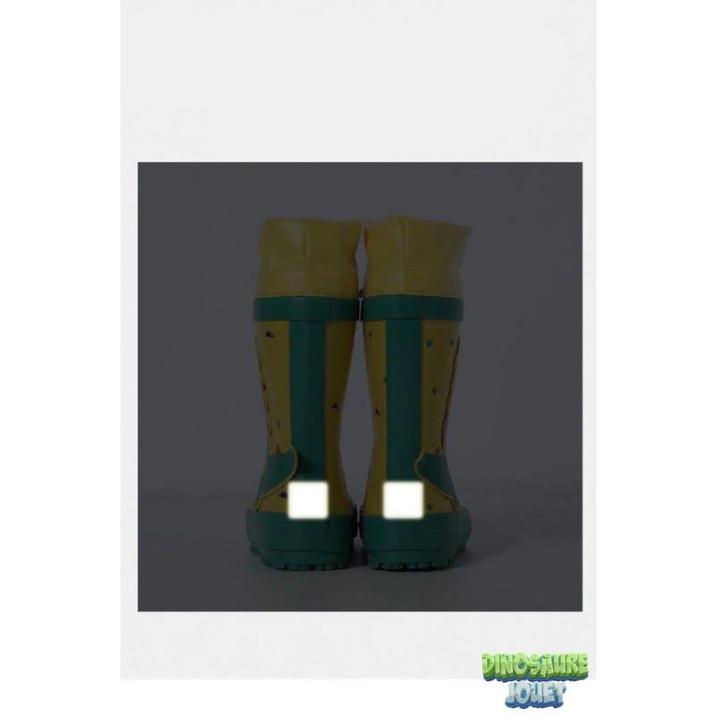 Dinosaure vert bottes jaunes