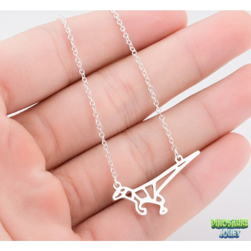 Longue chaine avec pendentif Dinosaure