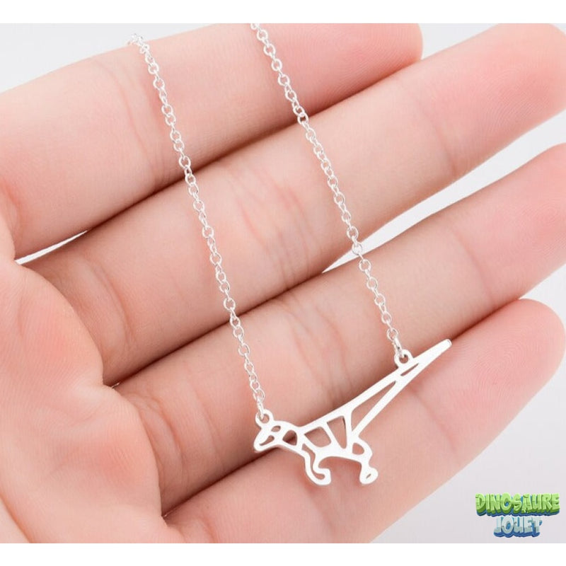 Longue chaine avec pendentif Dinosaure