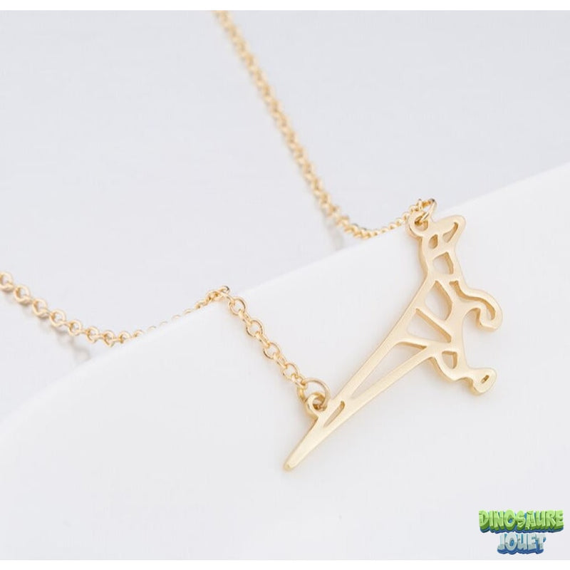 Longue chaine avec pendentif Dinosaure