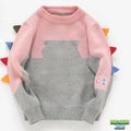 Pull tricot enfant dinosaure