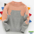 Pull tricot enfant dinosaure