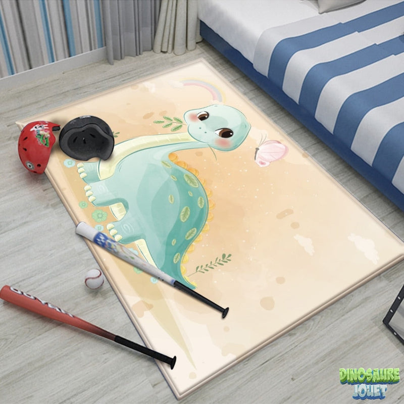 Tapis beige et bleu Dinosaure