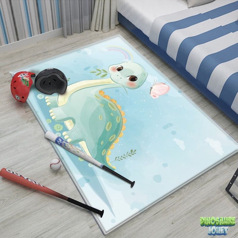 Tapis beige et bleu Dinosaure