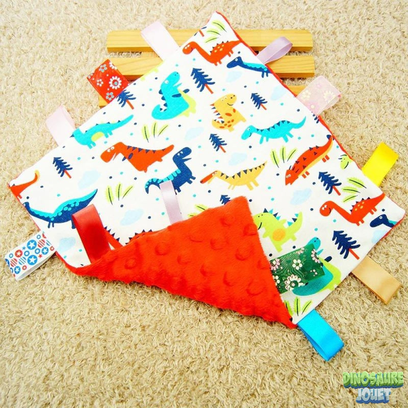 Tissu doudou motif Dinosaure